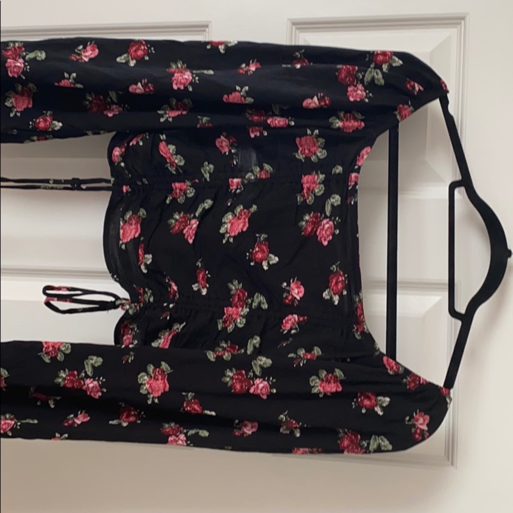 Cute blouse black with flowers on it ,
